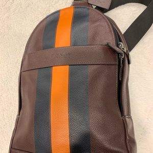 Coach Charles pack varsity leather